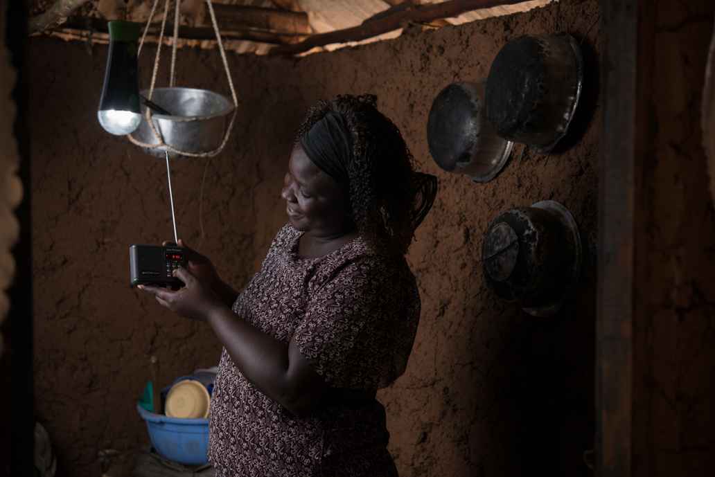 MKOPA woman in kitchen